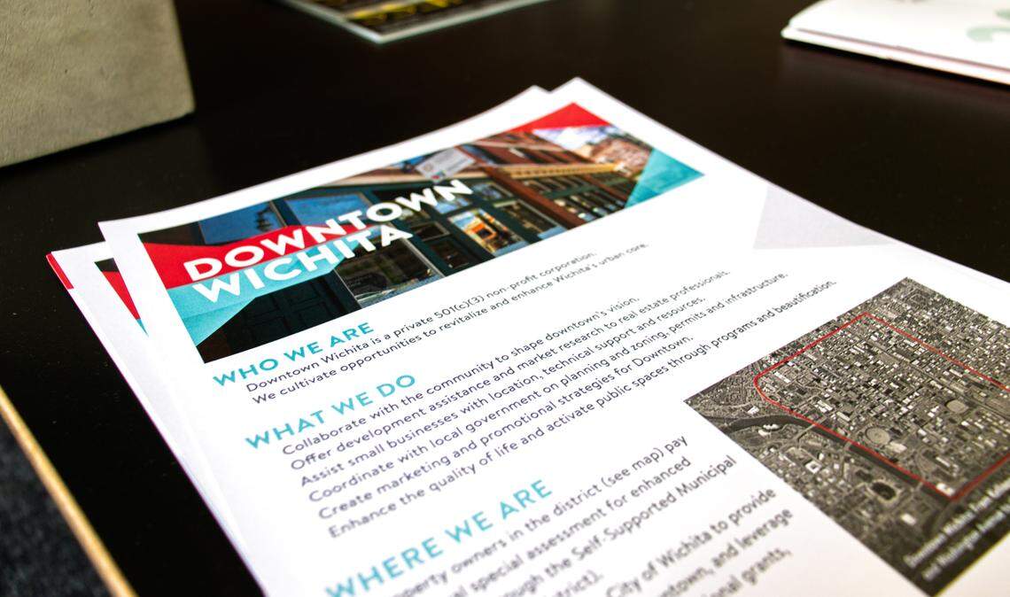 Information sheets about Downtown Wichita sit in the lobby of the nonprofit's office at 501 E. Douglas.