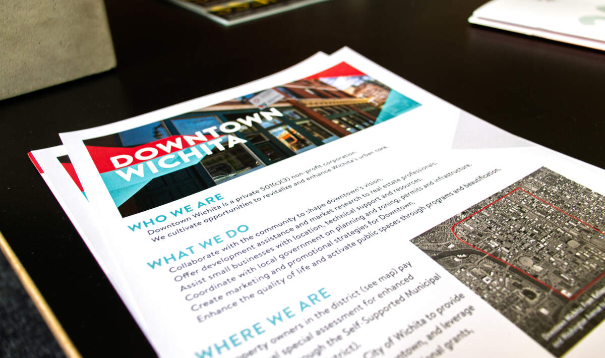 Information sheets about Downtown Wichita sit in the lobby of the nonprofit's office at 501 E. Douglas.