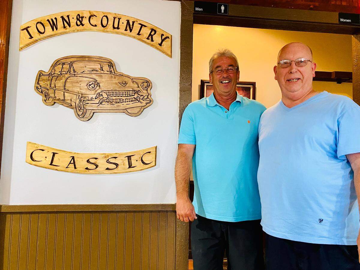 Billy Wood, right, and his manager Richard Hicks got the blessing of the Conover family to reopen the Town & Country after longtime owner Larry Conover died. They opened their own version at K-42 and Maize in July.