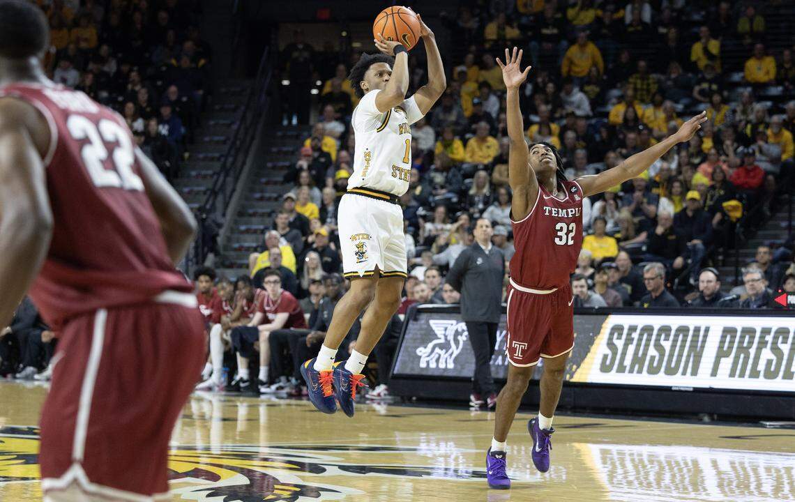 Wichita State’s Kenyon Giles hits a three pointer from the logo during the second half against Temple at Koch Arena on Saturday.