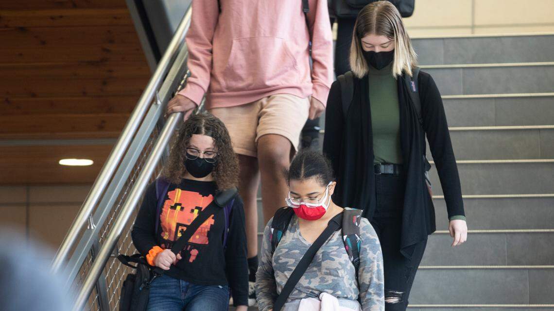 Northeast Magnet High School students walk in the halls in between class periods in 2021. Wichita Public Schools Superintendent Alicia Thompson said the district faces a COVID-19 “staffing crisis” that may require schools to shut down for several days.