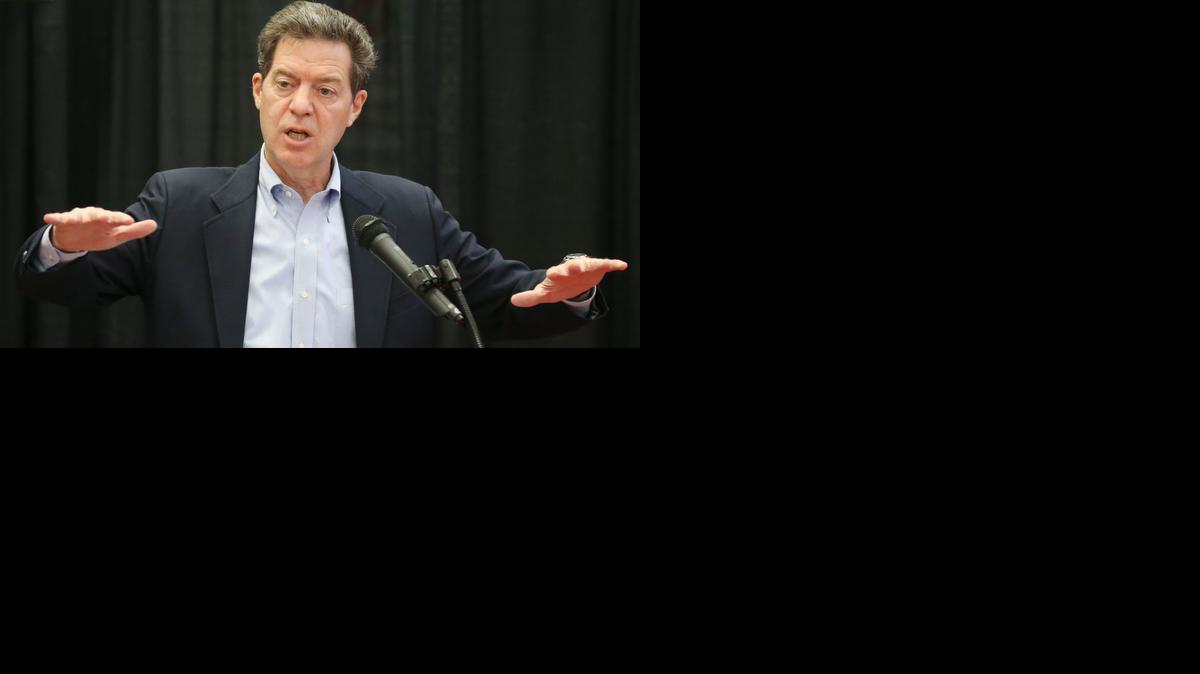Gov. Sam Brownback talks to a crowd in April in Wichita.