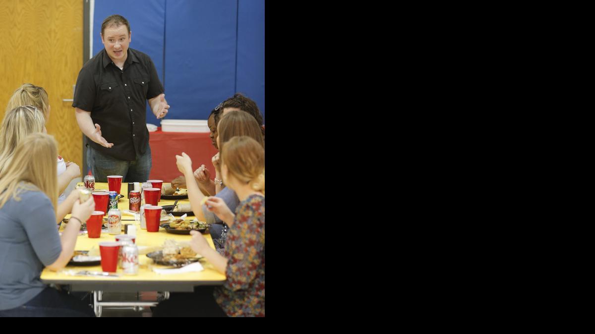 Terry Johnson of GracePoint Church visits with teachers at the Little Early Childhood Center on Wednesday. GracePoint is trying to establish a free supply store for local teachers. As part of their effort (and to thank teachers in general), they served lunch to teachers at the school on Wednesday

