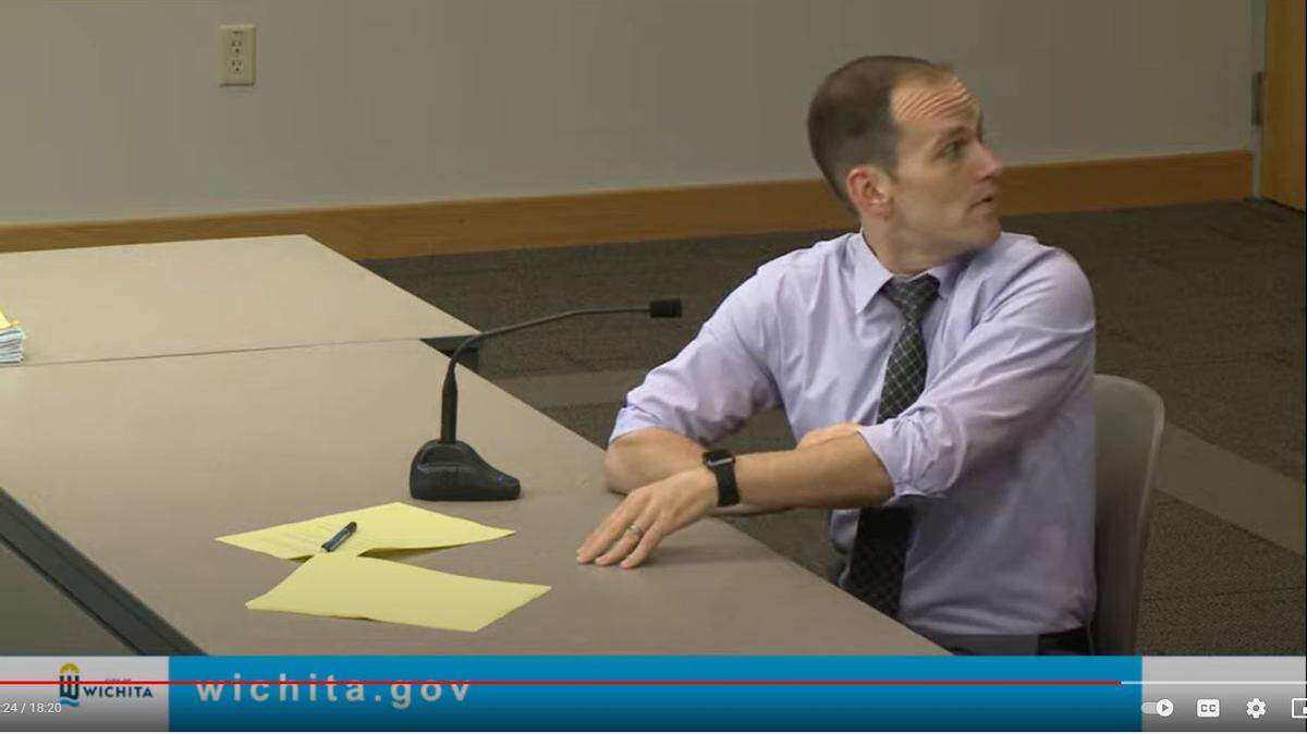 Wichita Mayor Brandon Whipple turns to look at a list of virtual attendees for Friday’s agenda review after one of them interrupted him.