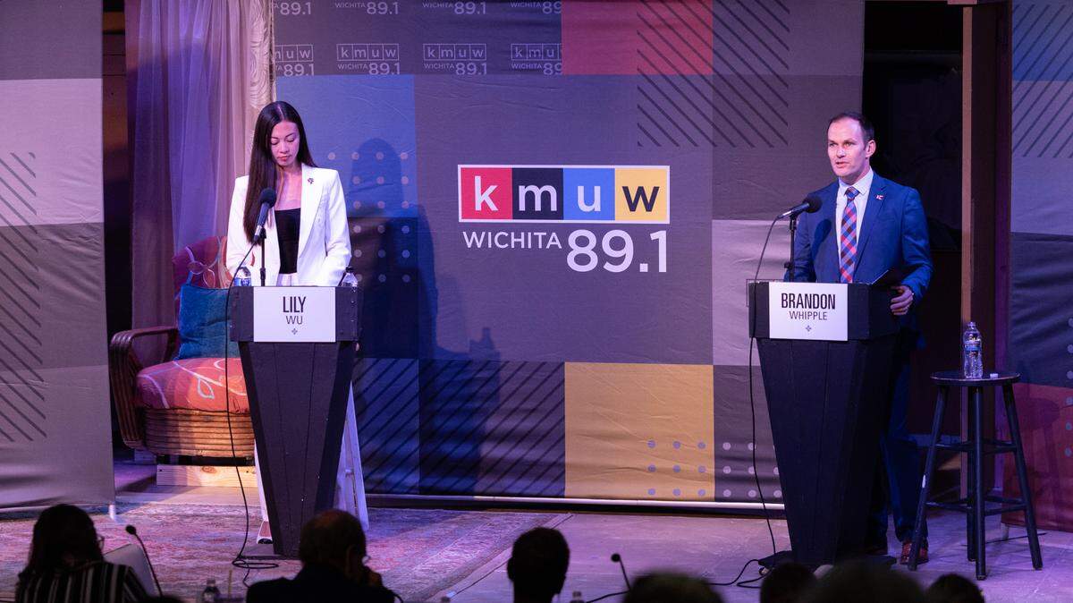 Mayor Brandon Whipple, right, and his challenger, Lily Wu, take part in a debate at Roxy’s Downtown on Monday night.