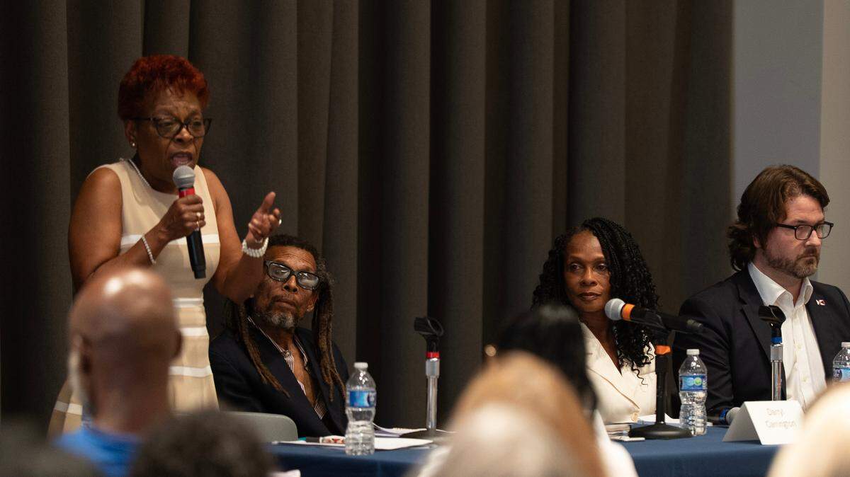 Wichita City Council candidate Aujanae Bennett answers a question during a District 1 candidate forum, where she met Republican operative Ben Davis, on July 15.