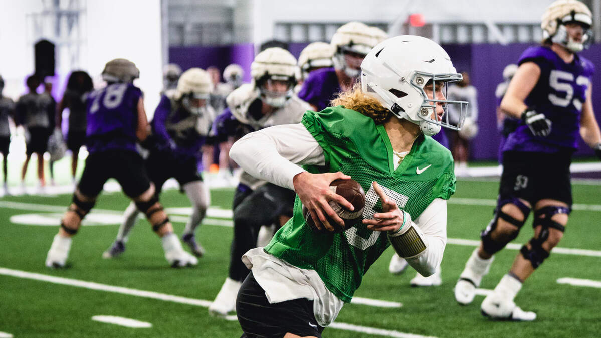 Kansas State freshman quarterback Avery Johnson runs during spring practice.