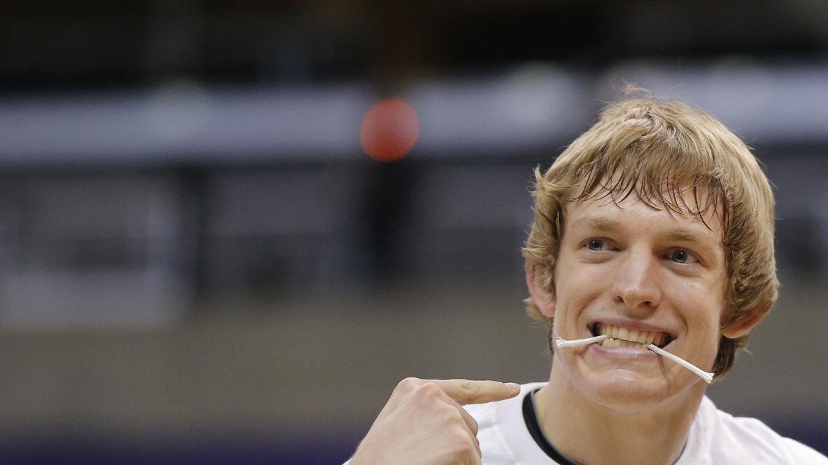 Wichita State Shockers guard Ron Baker (31) cuts down the net after beating Ohio State in the NCAA Tournament regional final at Staples Center in Los Angeles. The team will advance to the Final Four in Atlanta. (March 30, 2013)
