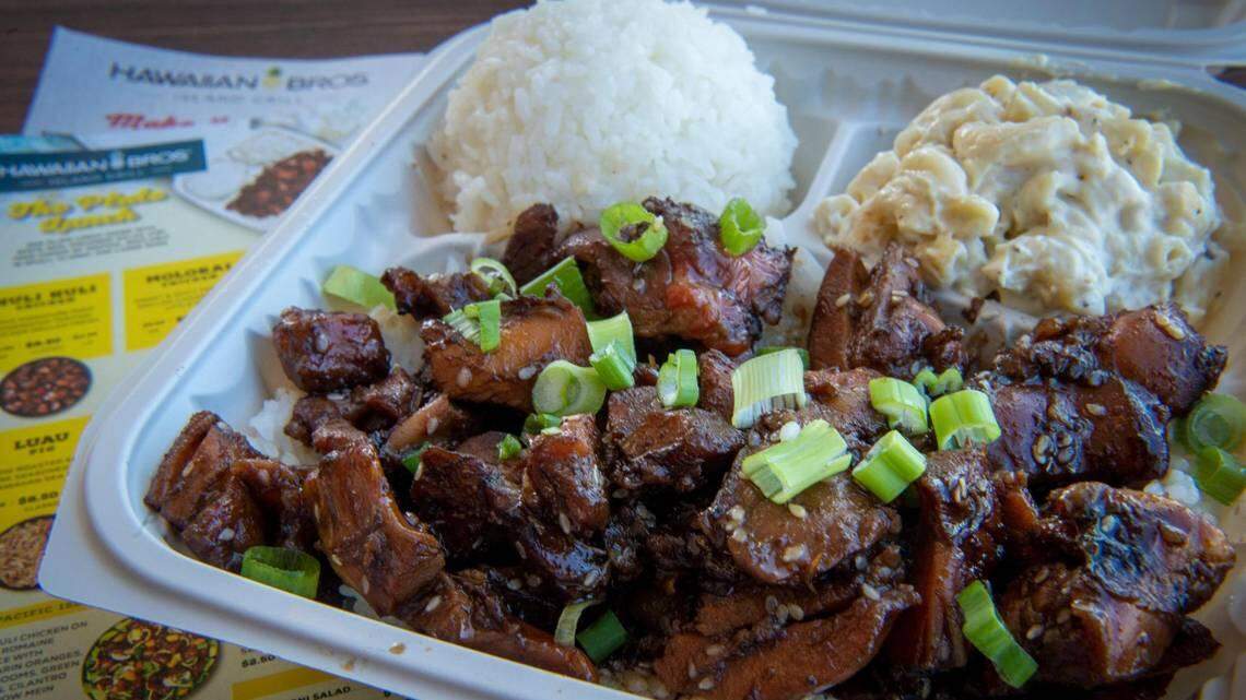 The Honolulu Chicken at Hawaiian Bros. is infused with garlic, green onions and sesame and served with macaroni salad and white rice.
