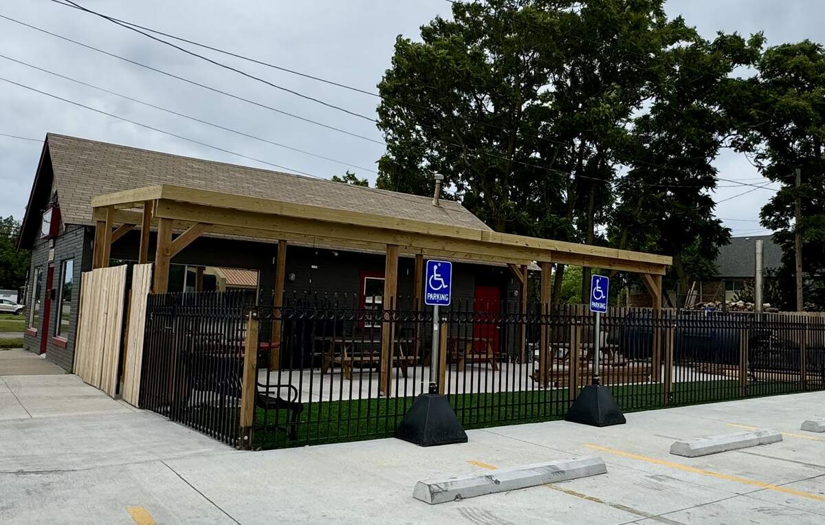 Barrel Boys BBQ owner Buddy King added a patio and a big parking lot to the east side of his building at 13th and McLean.