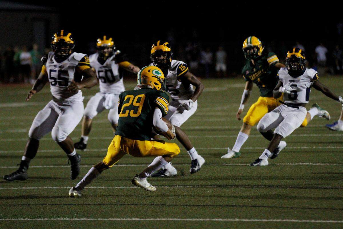 Bishop Carroll junior cornerback Dalton Nichols returns a kickoff against Wichita Northwest during the Grizzlies 23-22 win over the Golden Eagles on Friday night. (Aug. 31, 2018)