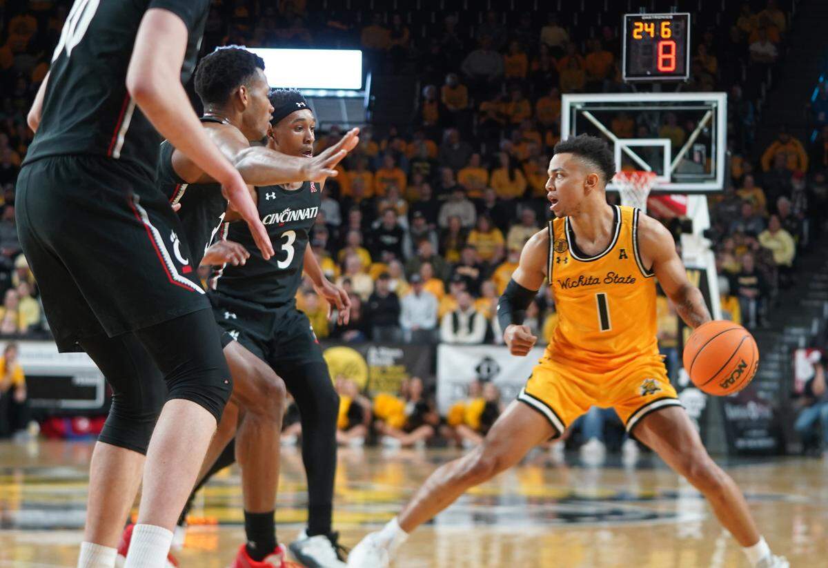 Wichita State’s Xavier Bell dribbles at the top of the key against Cincinnati.