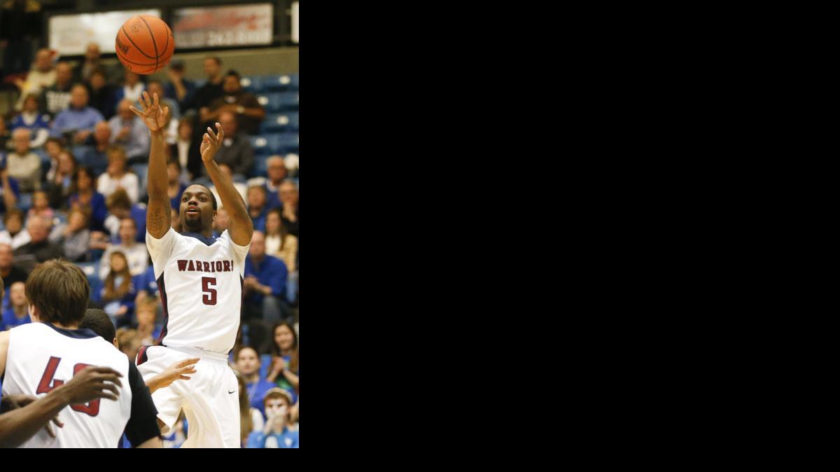 Sterling College’s Darius Alexander (5) shoots the ball in the first half against Tabor in the KCAC men’s final on Monday at Hartman Arena. 

