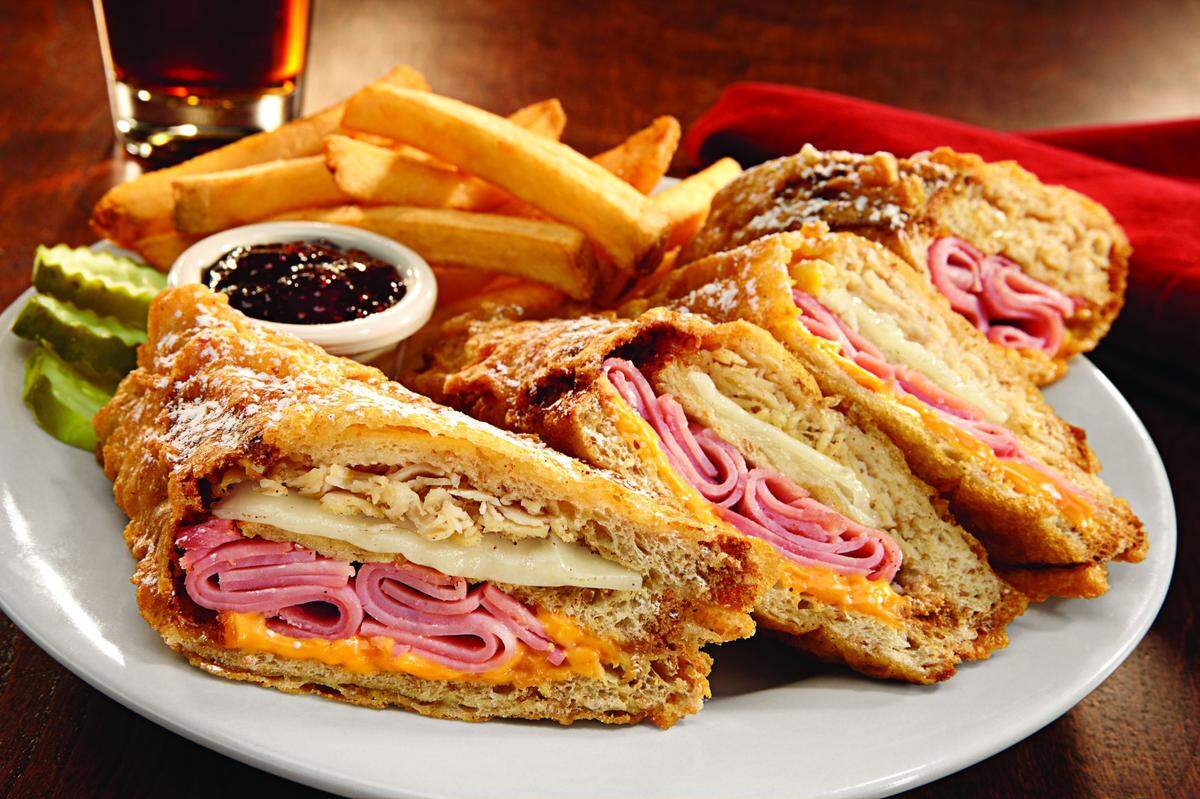 The famous Bennigan’s Monte Cristo sandwich is among the items on the Bennigan’s On the Fly menu. People who dine at the new 54 Craft & Co. also will be able to get them.