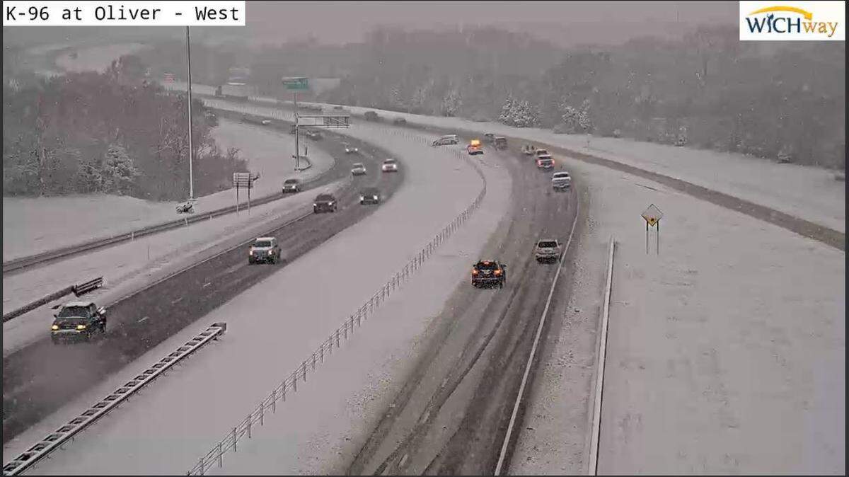 An emergency vehicle can be seen just before 9 a.m. Friday at an accident on K-96 near Oliver.