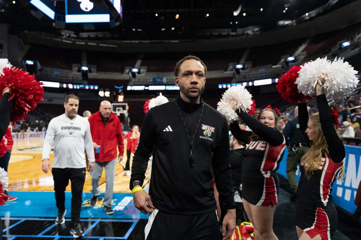 SIU Edwardsville assistant coach Jay Bradley leaves the court after an open practice at the 2025 NCAA Division I Men’s Basketball Championship at INTRUST Bank Arena. Bradley was stopped by several family members and a former Barclay College teacher who wanted to say hello to him.