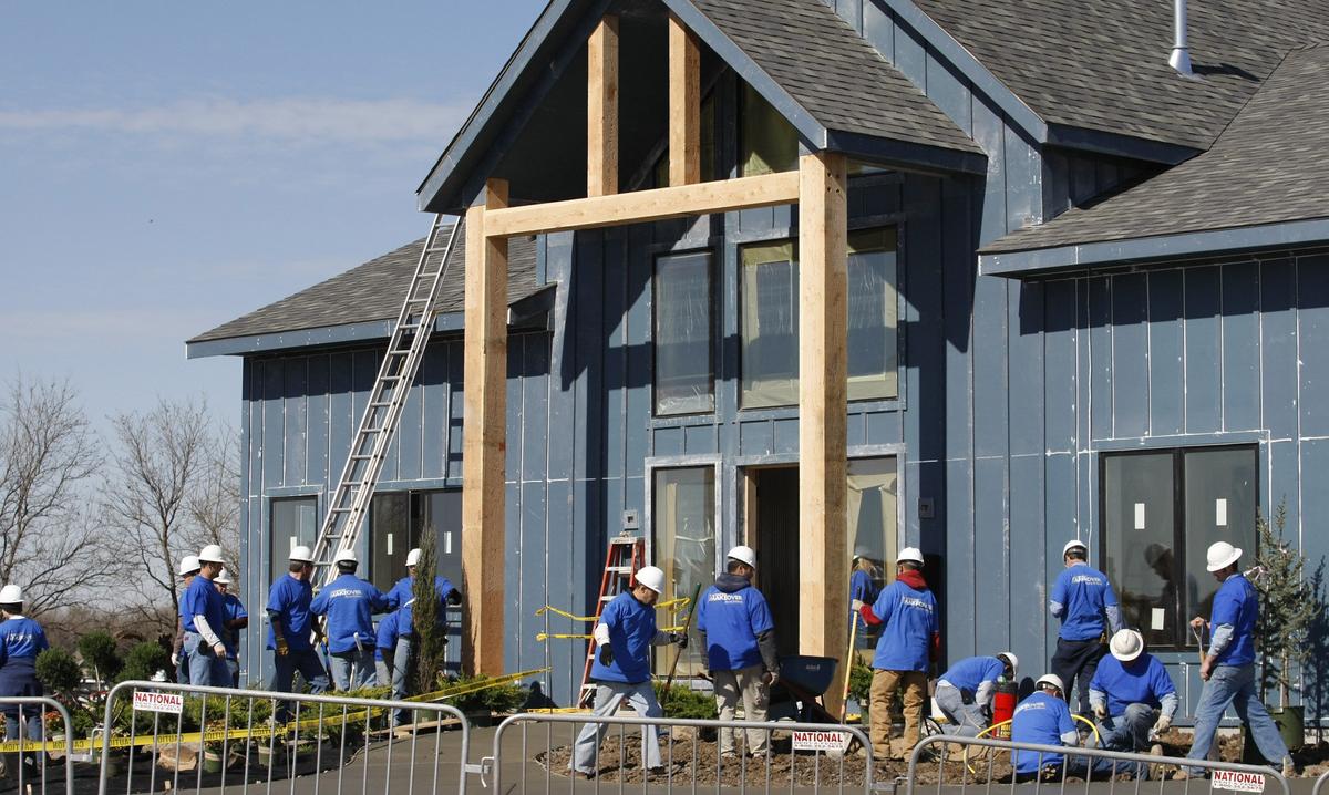 Work continues on the “Extreme Makeover: Home Edition” house being built for Carl Hall and his family near K-42 and Maize Road. (Feb. 22, 2011)