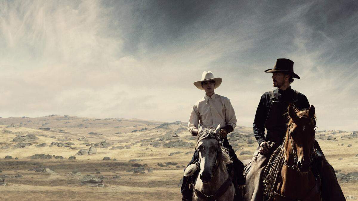 Kodi Smit-McPhee, left, and Benedict Cumberbatch star in “The Power of the Dog.”