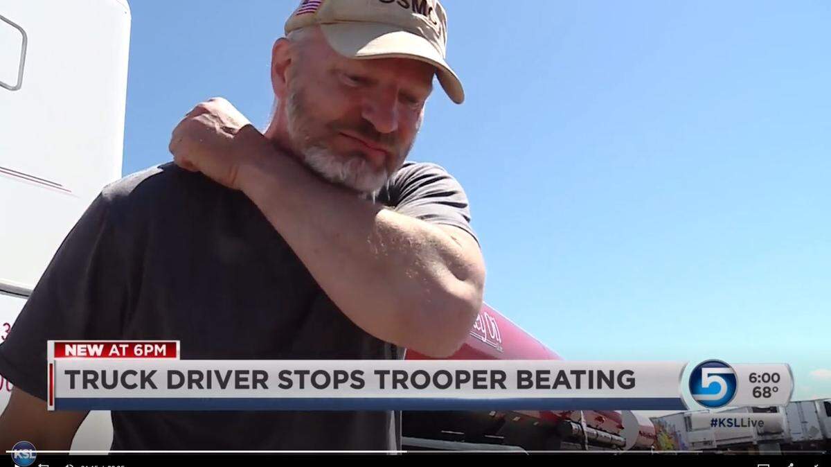 Iraq War veteran and trucker Darren Phillips demonstrates how he put a man in a choke-hold to help a Wyoming state trooper.