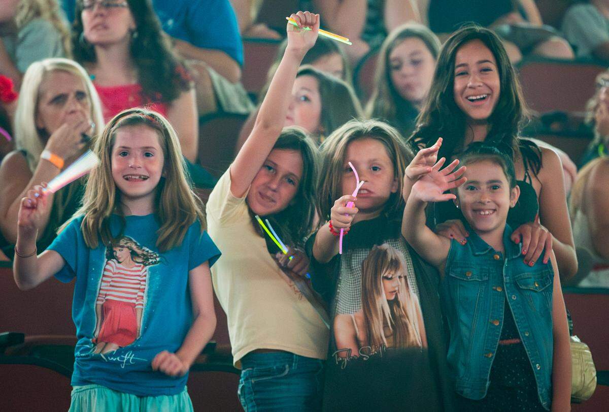 Caroline, left, Alexis, second from left and Sasha, second from right, at the Taylor Swift concert at Intrust Bank Arena in August 2013