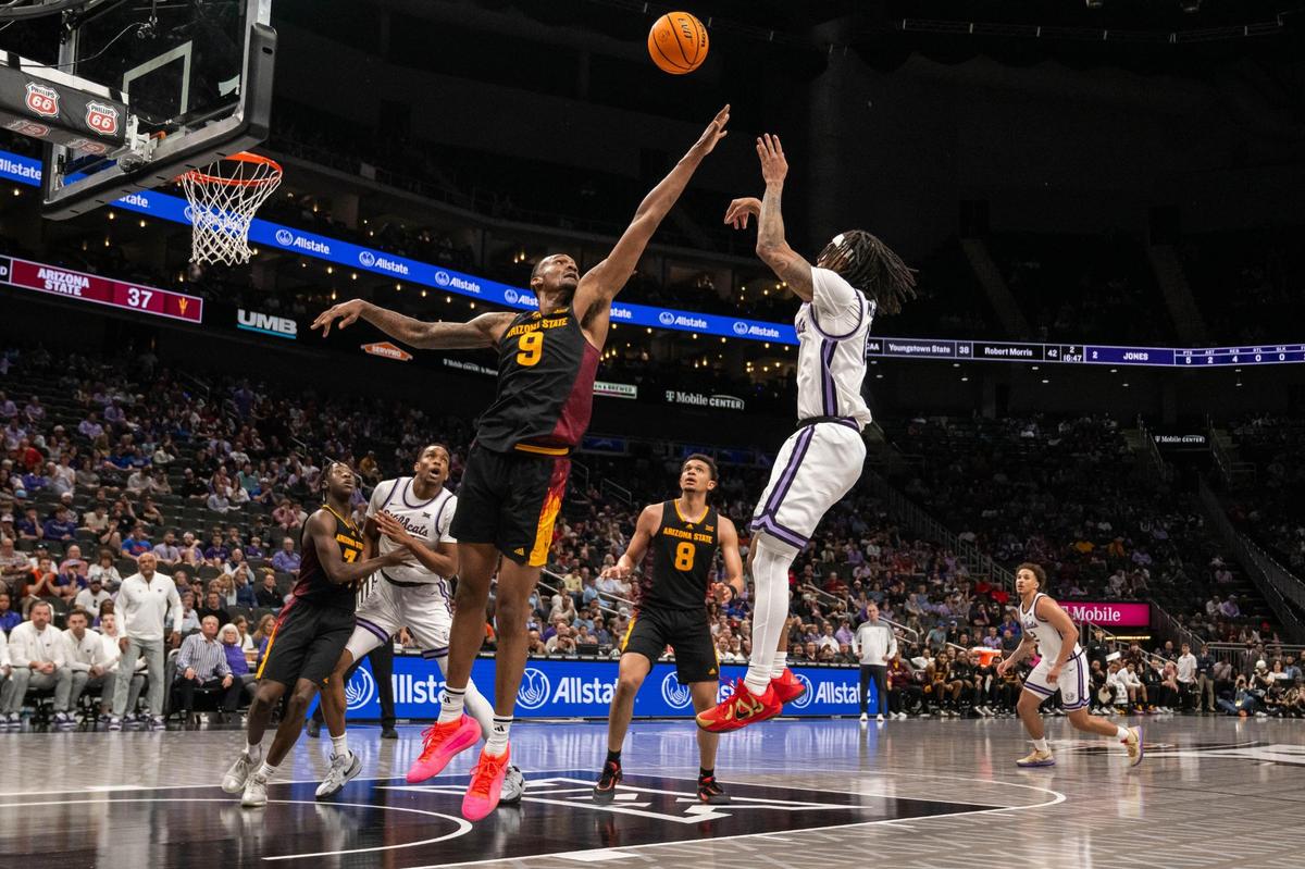Kansas State Wildcats guard Dug McDaniel shoots a fadeaway jumper in the second half of the Big 12 Championship First Round win vs. the Arizona State Sun Devils on Tuesday, Mar. 11, 2025 at T-Mobile Center. McDaniel ended the game with 14 points.