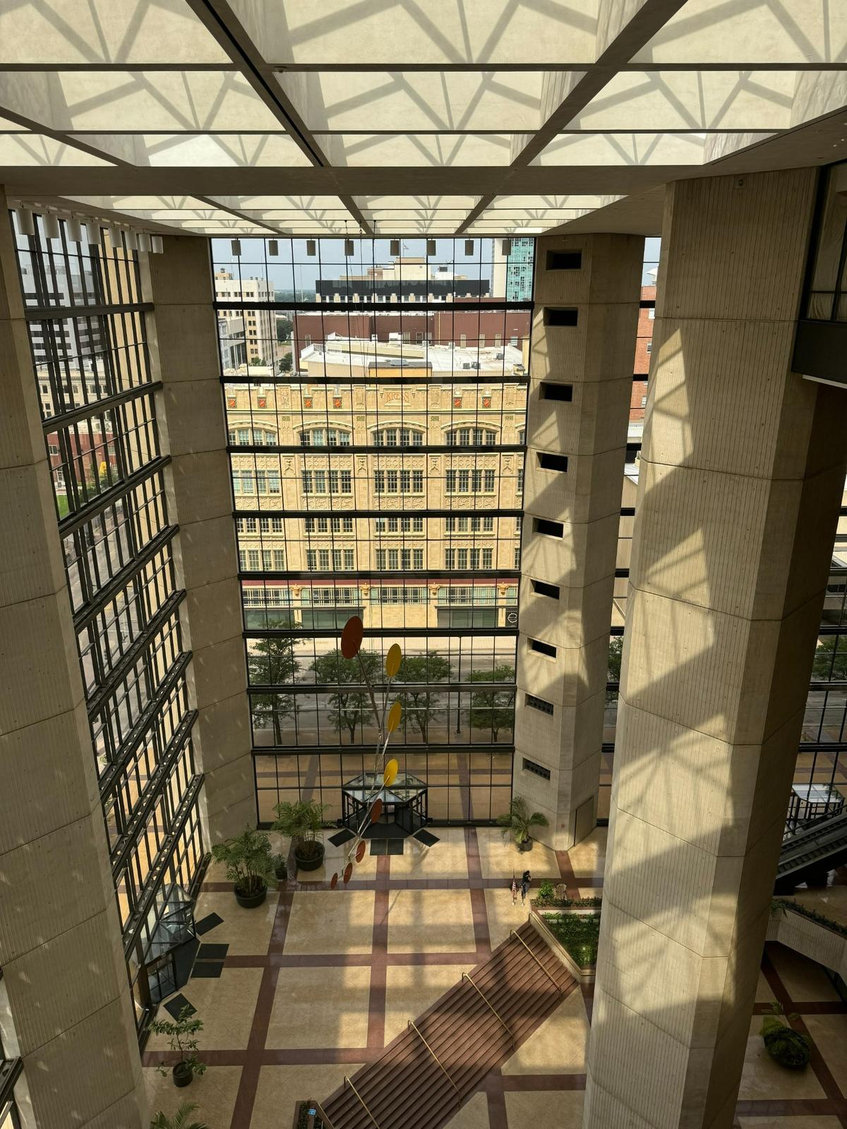 People looking down from the west-facing windows of The Petroleum Club have a view of the Ruffin Building lobby.