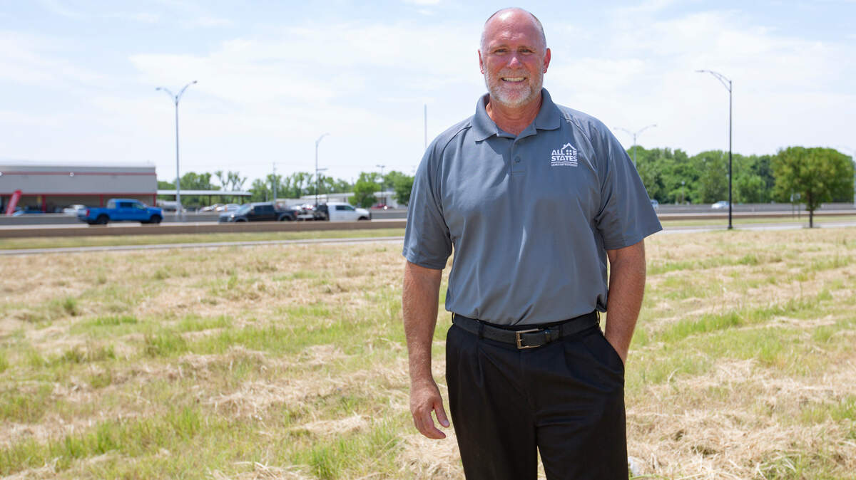Chris Keeter, owner of All States Home Improvement, stands where he’s planning a 20,000-square-foot headquarters that will have a warehouse, loading dock and showroom. The building will be on the frontage road on the north side of West Kellogg between Tyler and Maize Road.