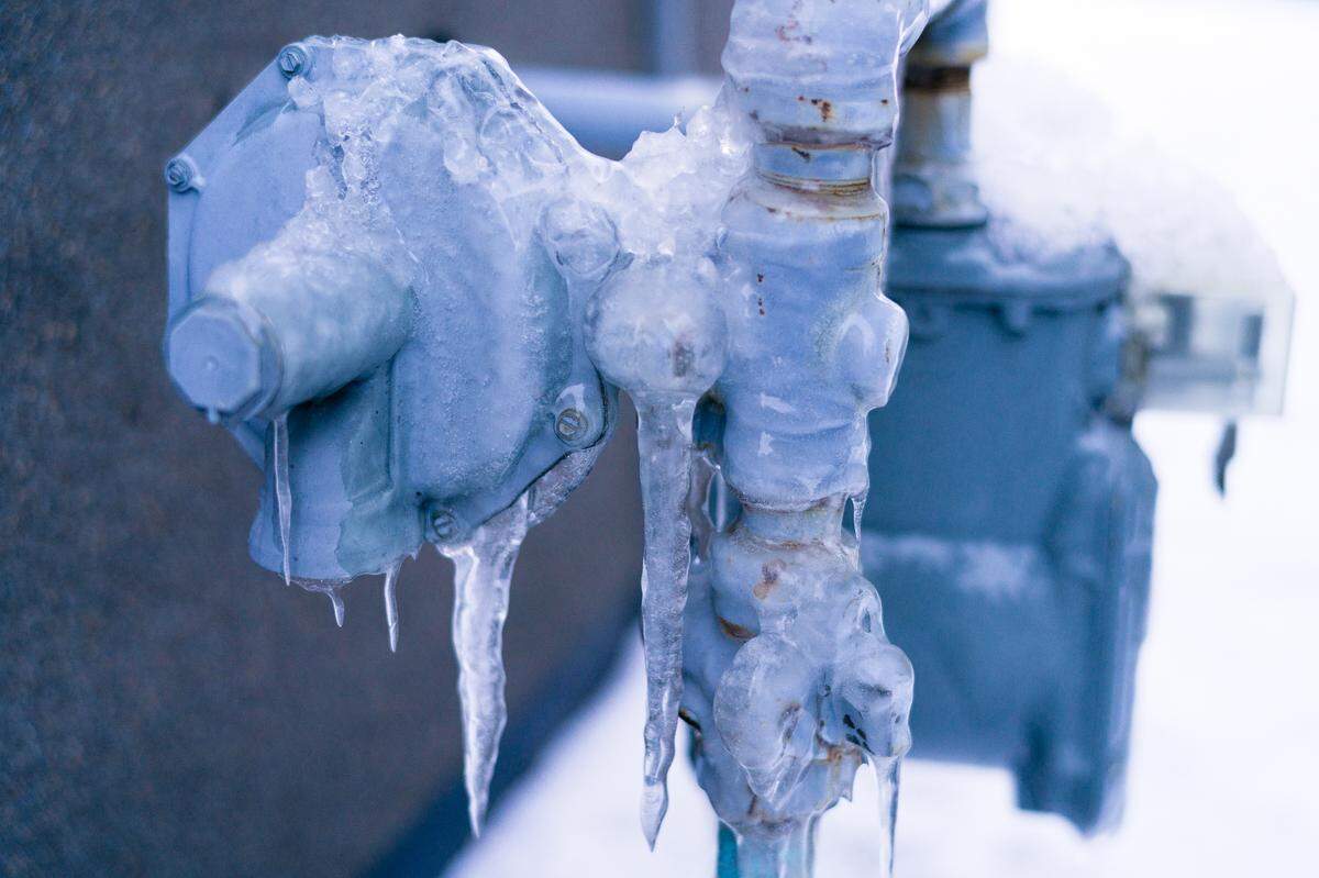 A coat of ice covers a gas meter outside of a home. A select group of gas marketers and commercial/industrial customers took more gas from the Kansas Gas Service system than they were entitled to during Winter Storm Uri in February 2021.
