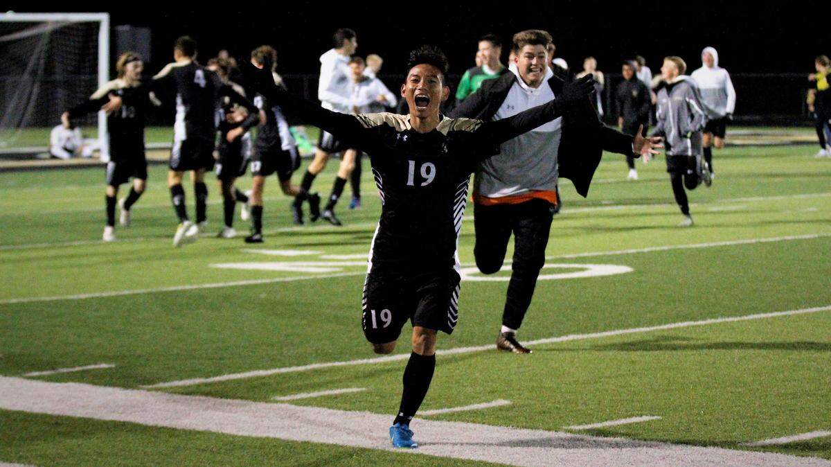 Maize South senior forward Nikkolas Vichith celebrates the Mavericks’ 2-1 double overtime regional championship win over Eisenhower on Thursday night. (Oct. 25, 2018)