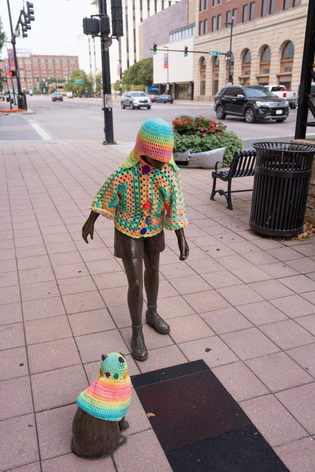 Crochet artist Tamara Gonzales may dress the downtown statues again for the Tallgrass Film Festival. For now, though, she’s taking the remaining items home for safekeeping.