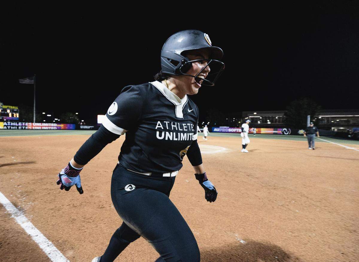 Tori Vidales celebrates a walk-off home run to lift Team Alo to a 3-2 victory on Wednesday evening at Wilkins Stadium in a AUX Pro Softball game.