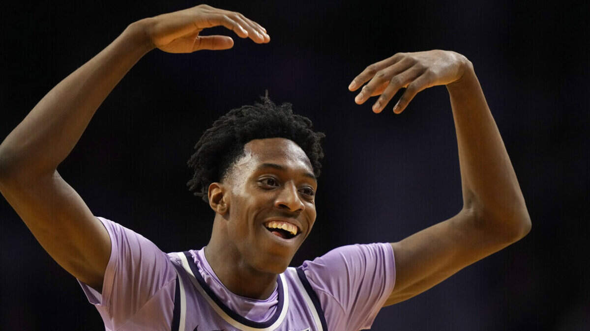 Kansas State forward Nae’Qwan Tomlin celebrates a teammate’s basket during the first half of a game against Florida on Saturday, Jan. 28, 2023, in Manhattan, Kan.