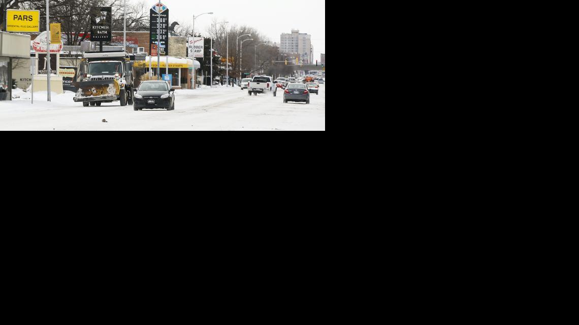 A snowplow travels down Douglas. (Feb. 6, 2014)

