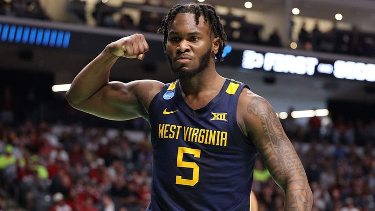West Virginia basketball player Joe Toussaint is considering his transfer options this summer.