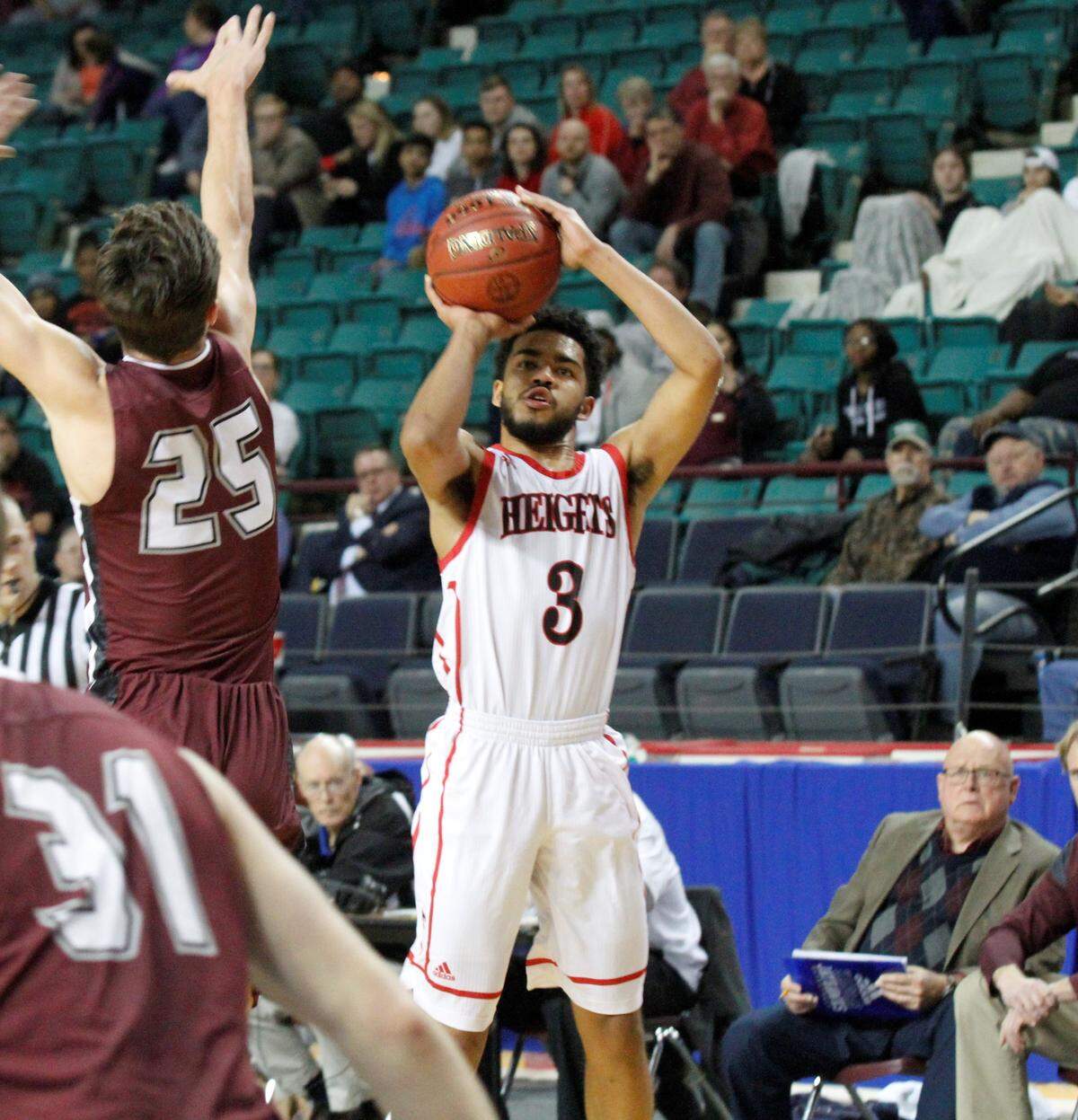 Devin Davis, a Wichita Heights boys basketball senior guard.