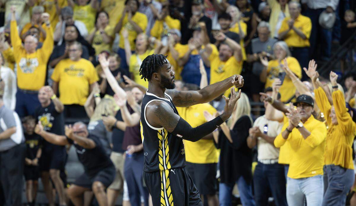 Rashard Kelly begins the celebration early as the Wichita State pulled within a few points of winning during the championship game against Eberlein Drive.
