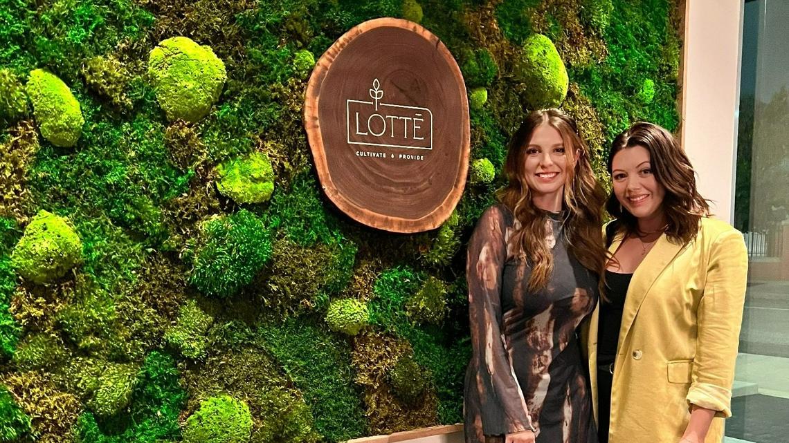 Grow Giesen Plant Shop owner Heather Giesen, right, is starting a new plant design business called Planterior. She and Planterior designer Hannah Critchlow are standing at a moss wall that they and Giesen’s husband, Slade Giesen, installed at the new Lotte restaurant downtown.