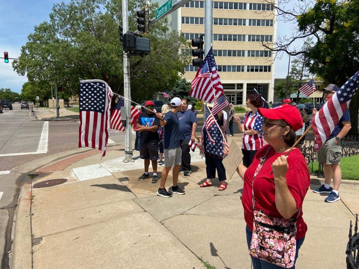 The Sedgwick County Republican Party organized a rally to celebrate Flag Day and President Trump’s birthday on Saturday in front of the Historic Courthouse downtown.