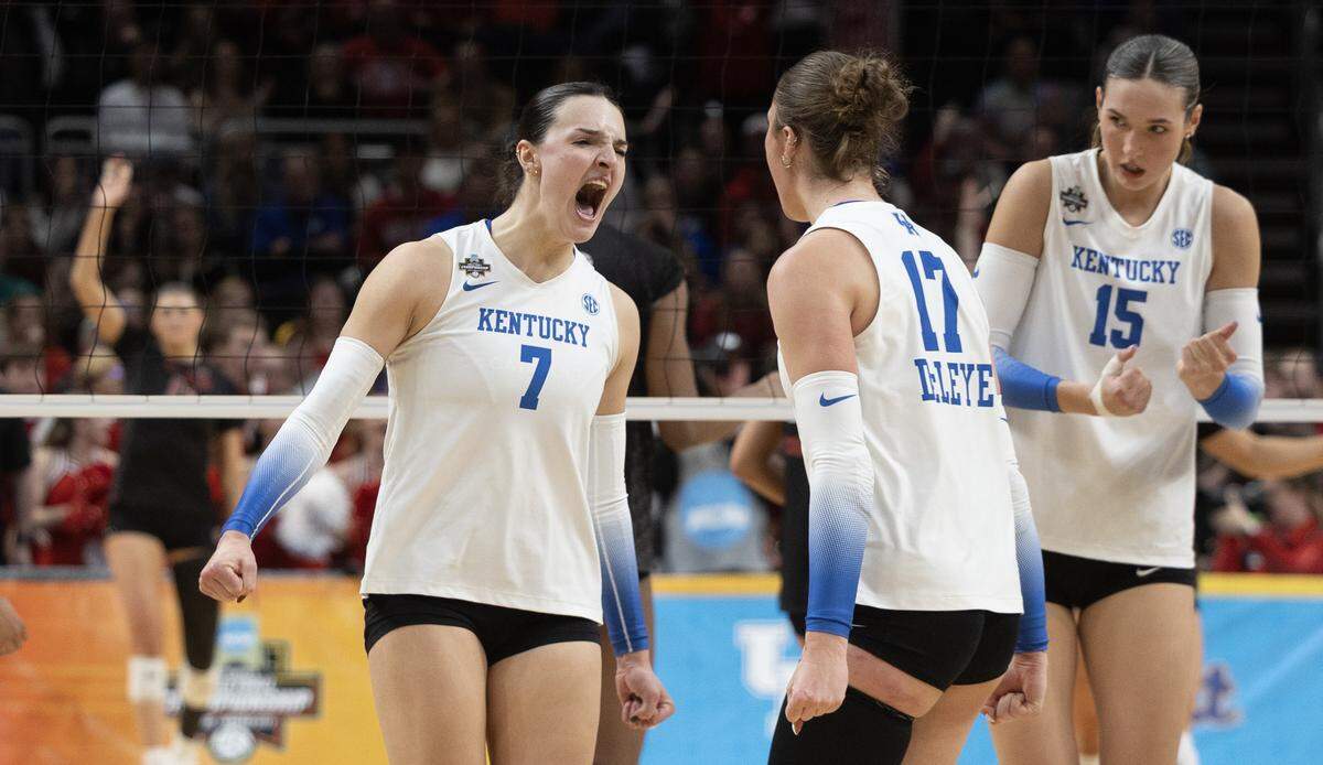 Kentucky’s Eva Hudson celebrates a point in the fifth set against Wisconsin during their semifinal match of the NCAA Volleyball Championship on Thursday night at the T-Mobile Center.