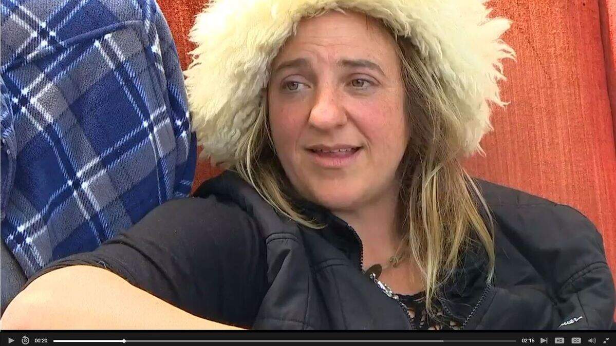 Melissa Burns lived in a homeless "mansion" near the Seattle Space Needle for 81 days while refusing shelter help. Then a nonprofit bought her and her husband two free plane tickets to Manhattan, Kansas, where they have family.