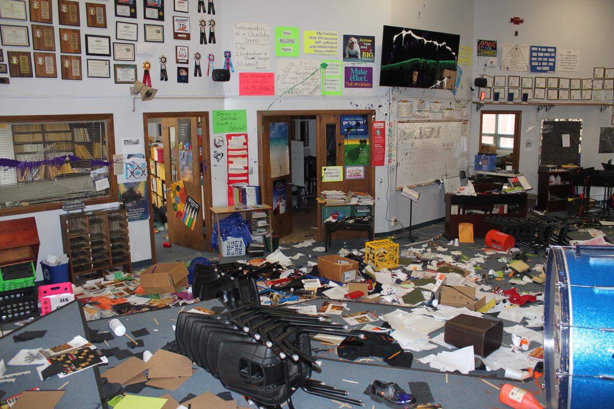 Law enforcement and school officials estimate that vandals caused between $50,000 and $75,000 of damage in the band room of Pretty Prairie High School.