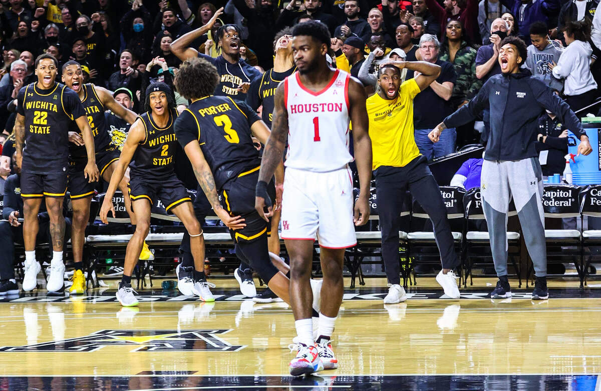 The Wichita State bench celebrates a highlight-reel dunk from Craig Porter late in the Houston game.