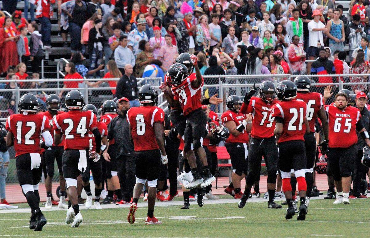 Delazis Smith, a Wichita Heights junior cornerback, celebrates a pass break-up against Bishop Carroll in the Golden Eagles’ 36-20 win over the Falcons on Friday. (Sept. 7, 2018)