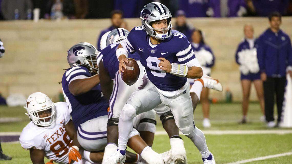 Kansas State quarterback Adrian Martinez (9) scrambles against Texas during the second half of an NCAA college football game Saturday, Nov. 5, 2022, in Manhattan, Kan. (AP Photo/Reed Hoffmann)