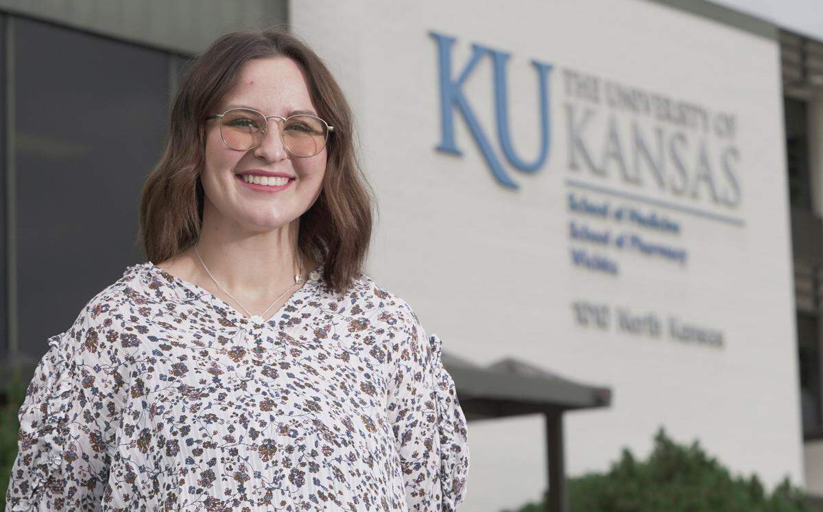 Taylor Carter in front of the KU School of Medicine in Wichita. (May 27, 2021)