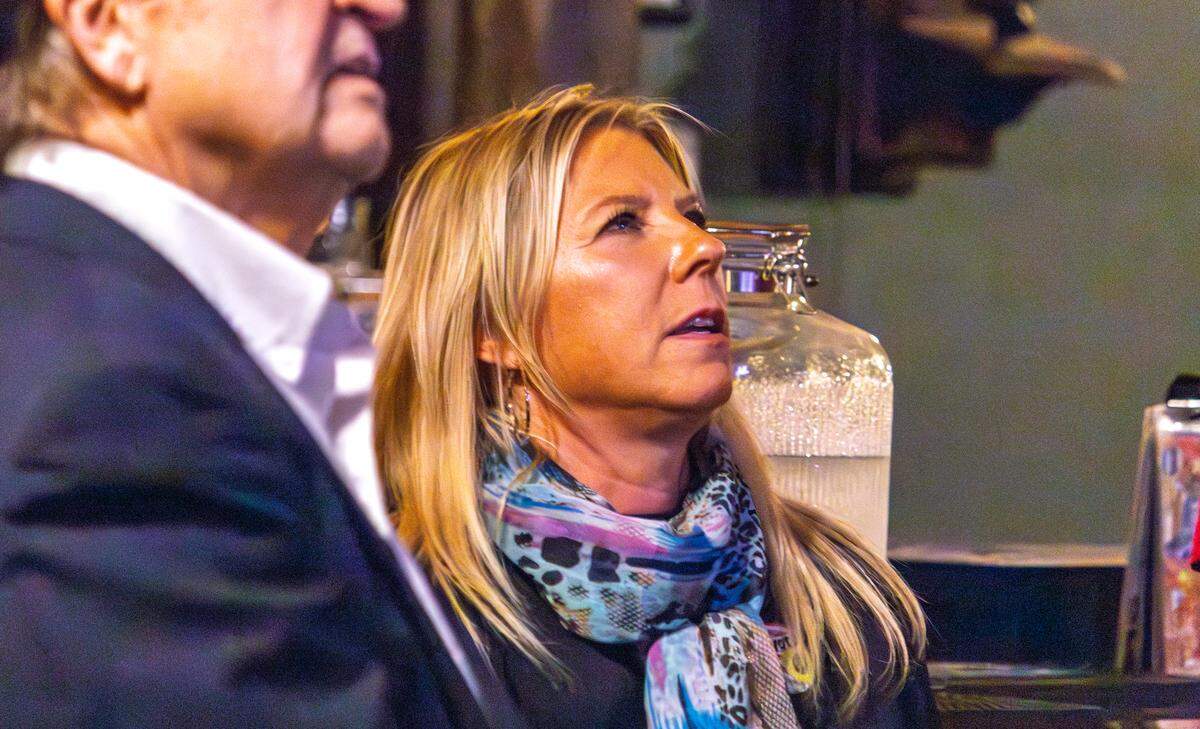 Amy Jensen looks at early election results while attending her watch party on Nov. 4. Jensen won the Wichita Public School District 5 school board seat, defeating incumbent Kathy Bond.