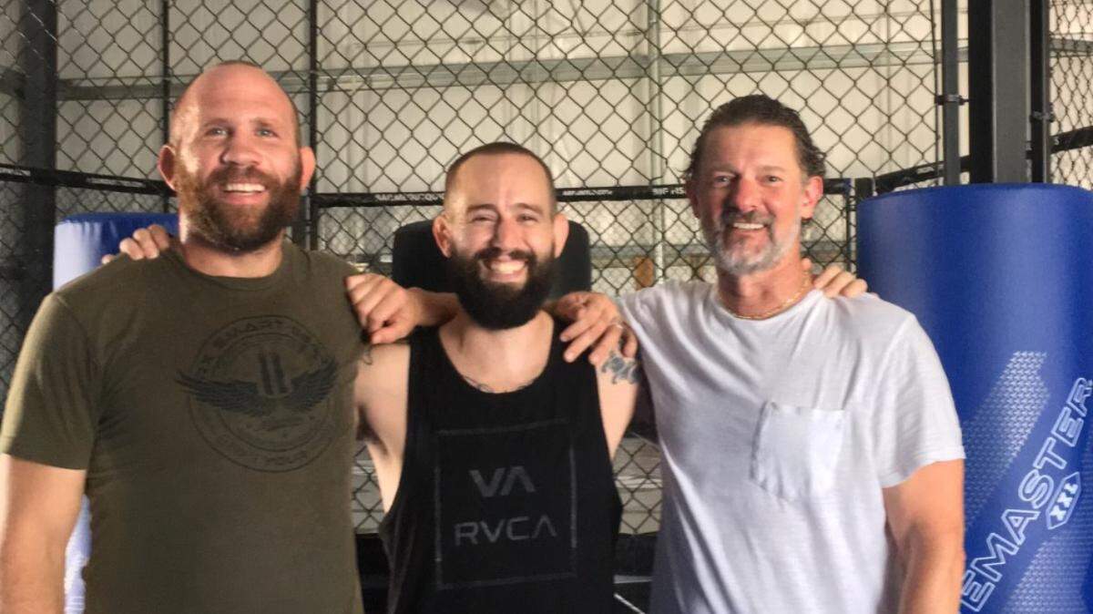 Dave Rickels, left, Cody Bitler, center and Steve Hanson have opened 31Six Martial Arts, a business that grew out of their Evolution Fighting Championship events.