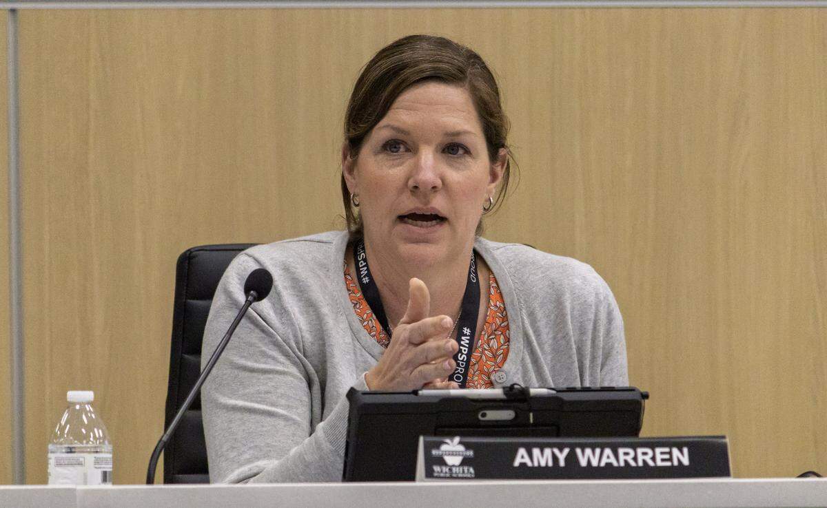Amy Warren, the District 6 representative on the Wichita Public Schools Board of Education, proposes a motion to reopen the Facility Master Plan and reassess the closures of four elementary schools. The motion failed and the proposed timeline was approved.