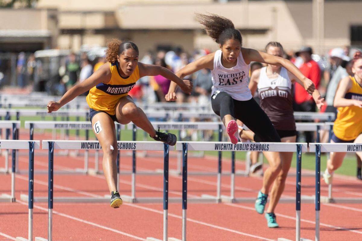 Wichita Northwest sophomore Adryanna Shelby (left) won the Class 6A championship in the 300-meter hurdles race at the Kansas high school state track and field meet last month.