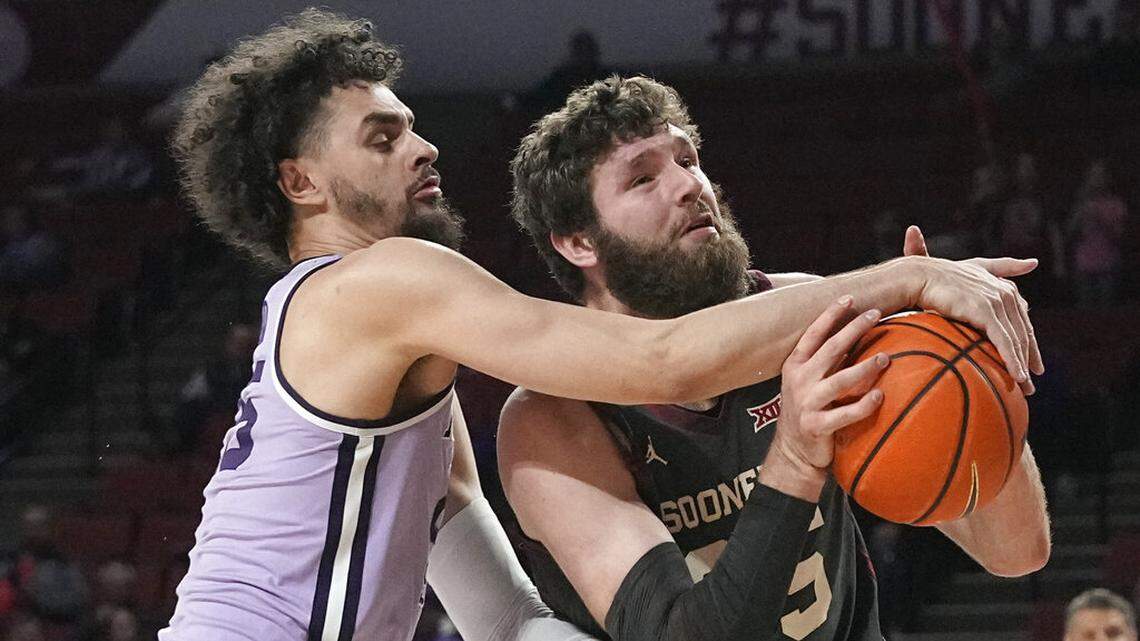 Kansas State forward Ismael Massoud (left) fouls Oklahoma forward Tanner Groves in the second half on Tuesday, Feb. 14, 2023, in Norman, Okla.